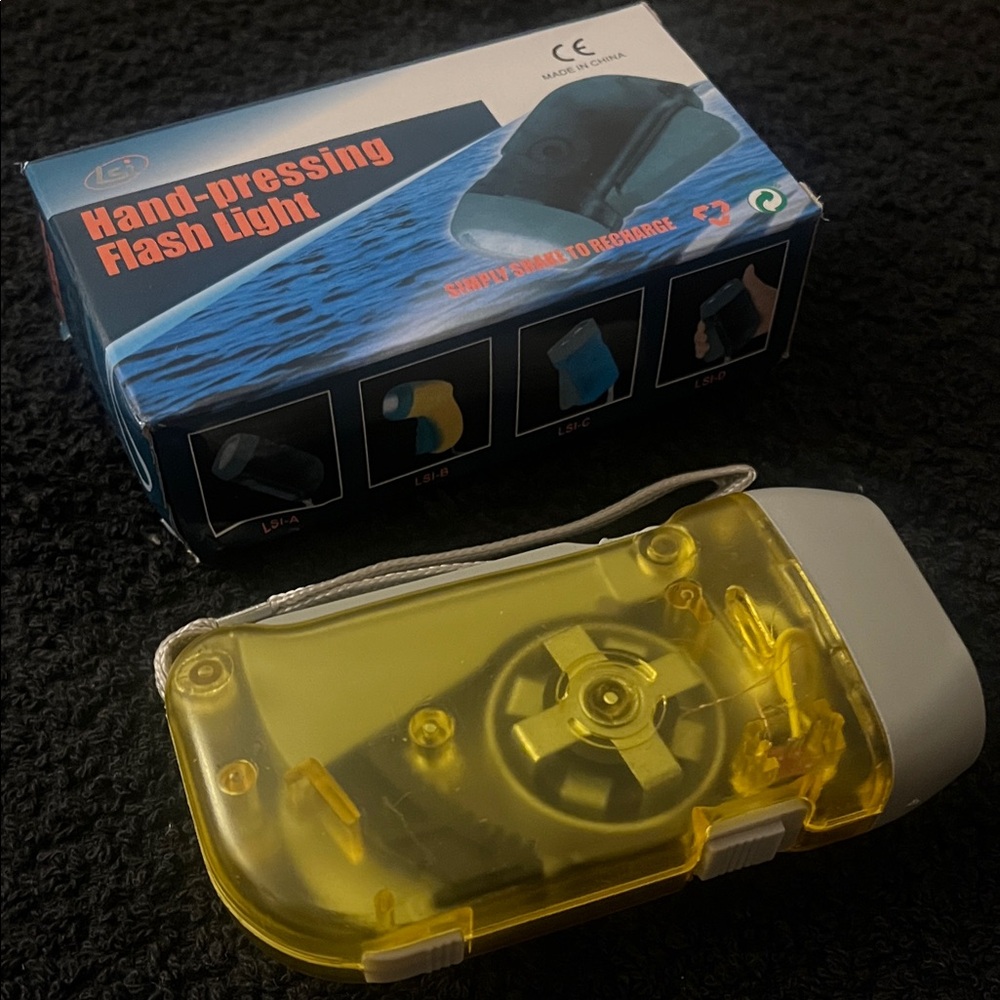 Transparent Yellow Hand-Press Flashlight